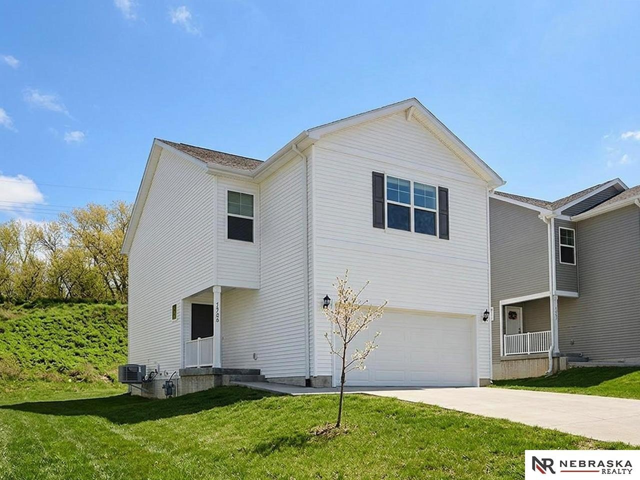 Single Family 4BR 3BA - 7728 N 95th Avenue, Omaha, NE