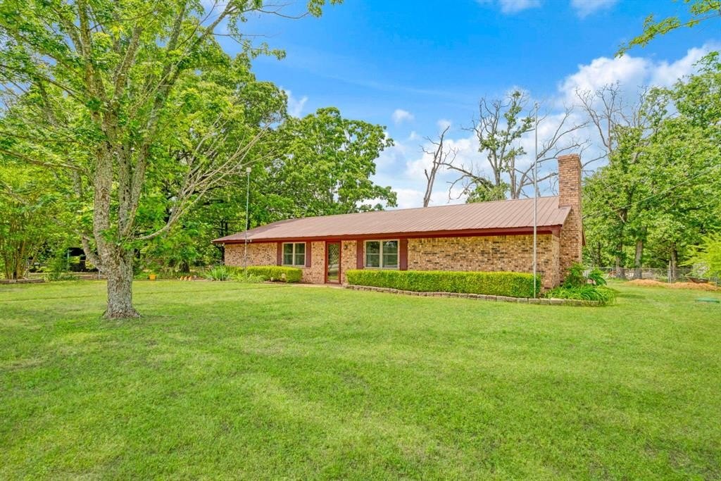 Single Family 3BR 2BA - 9157 N HWY 271, Powderly, TX