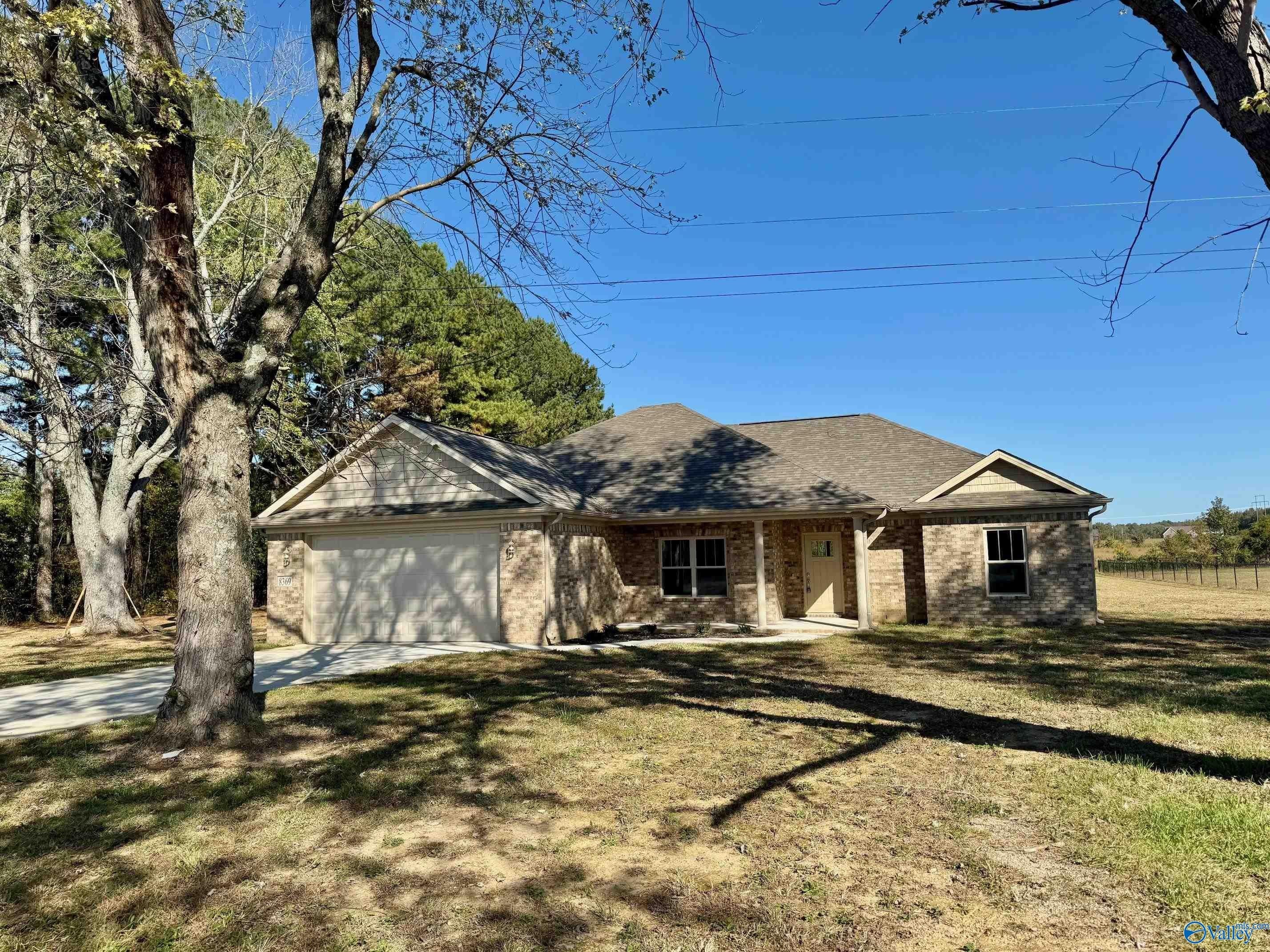 Single Family 4BR 2BA - 8369 State Line Road, Taft, TN