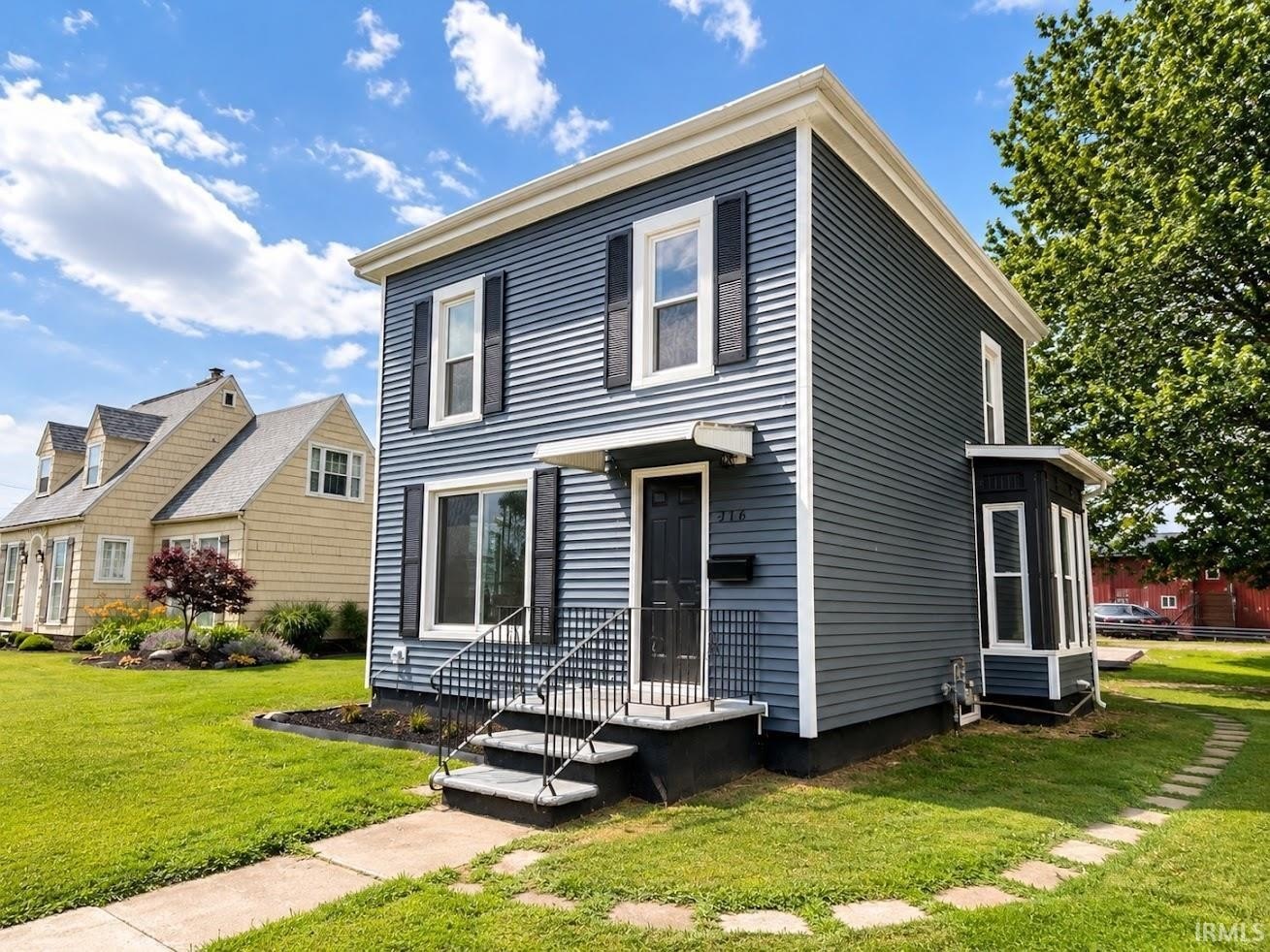 Single Family 4BR 2BA - 416 W 7th Street, Auburn, IN