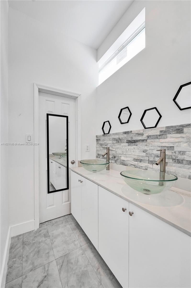 Four-plex 6BR 7BA - 418 NW 47th St, Miami, FL