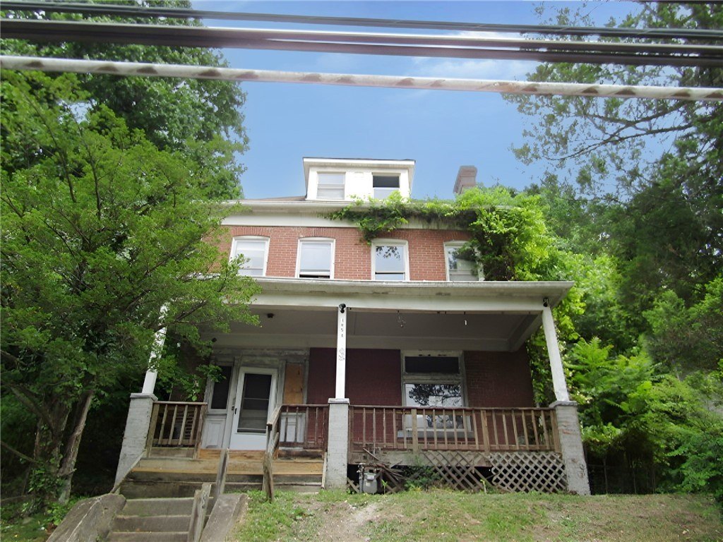 Single Family 5BR 1BA - 1058 Blackadore St, Homewood Brushton, PA