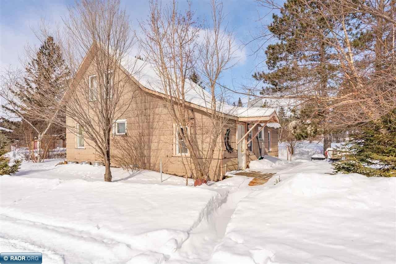 Single Family 4BR 1BA - 24 2nd Ave, Soudan, MN