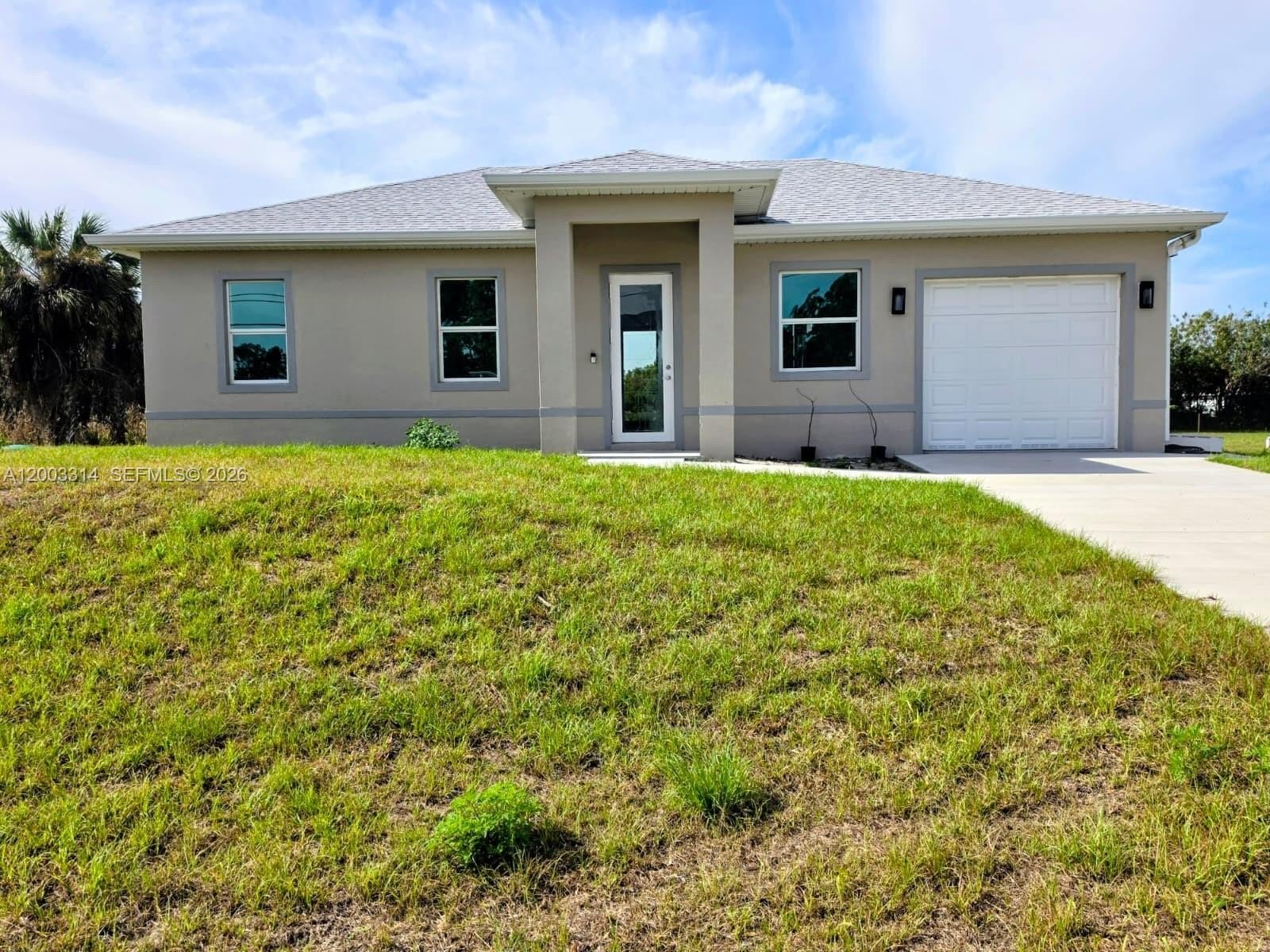 Single Family 3BR 3BA - 402 Harrison Dr, Lehigh Acres, FL