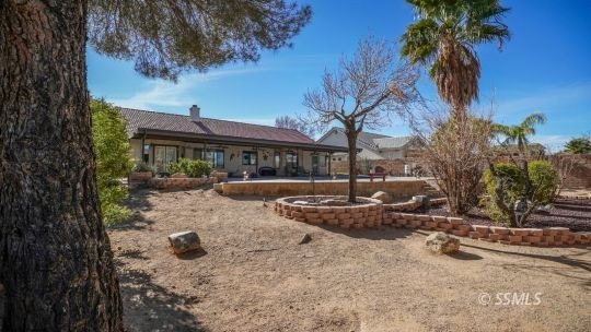 108 W Smoke Tree Ave  