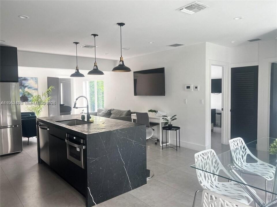 Single Family 4BR 3BA - 15 NW 52nd St, Miami, FL
