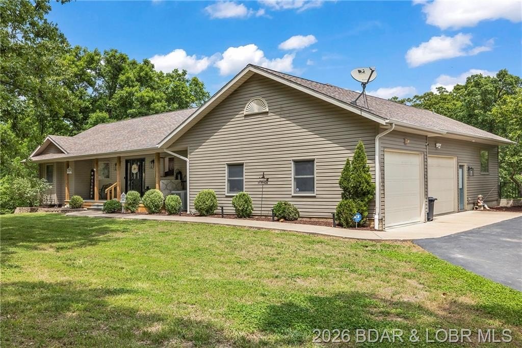 Single Family 5BR 3BA - 151 Persimmon Lane, Laurie, MO