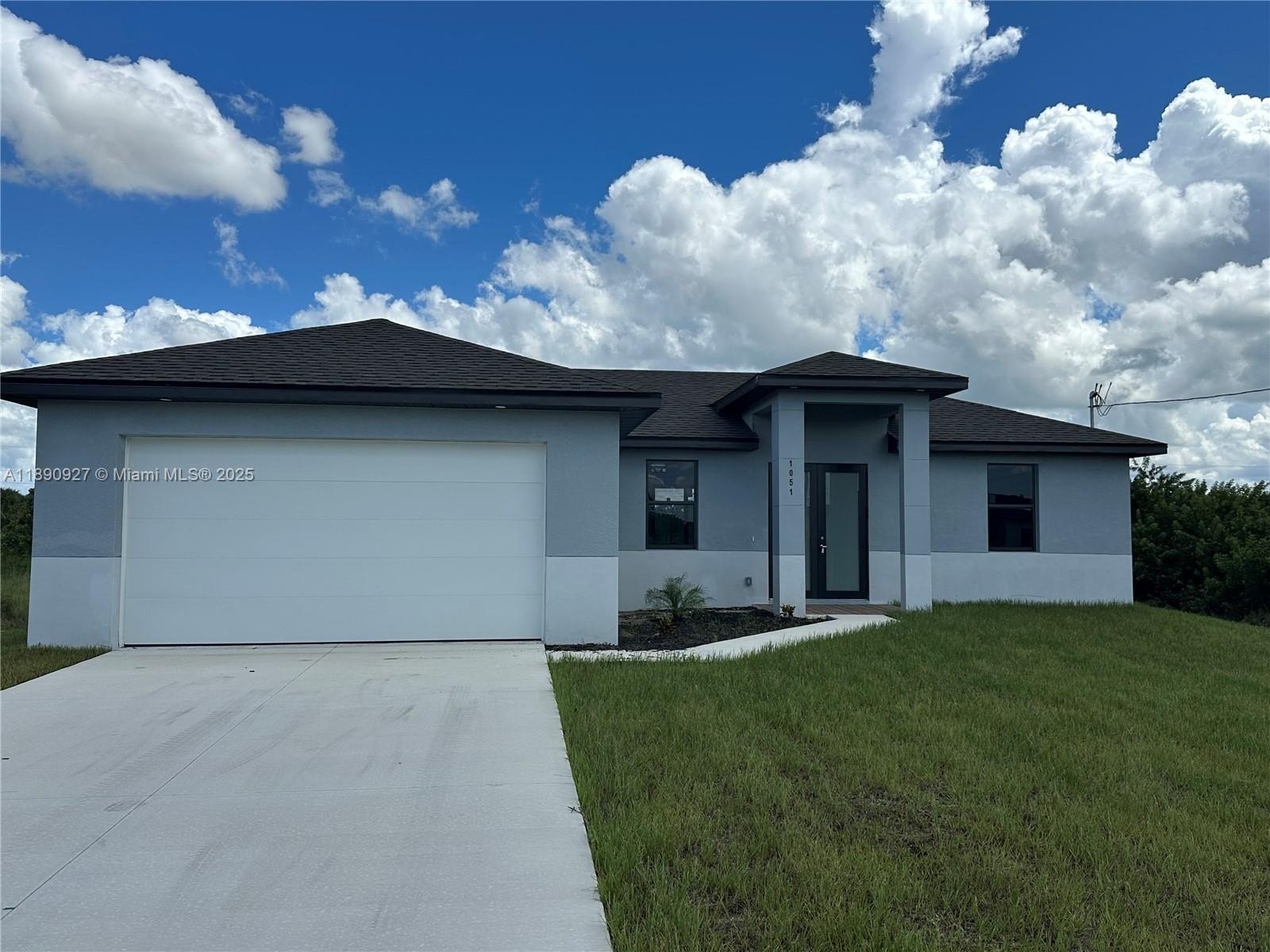 Single Family 3BR 2BA - 612 Ames ST E, Lehigh Acres, FL