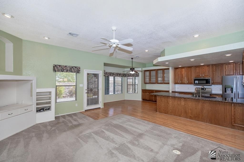 13902 E 53 Dr