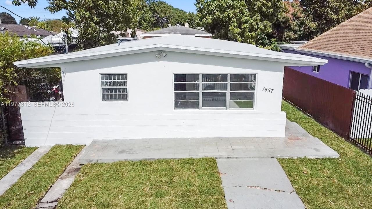 Single Family 4BR 2BA - 1557 NW 66th St, Miami, FL